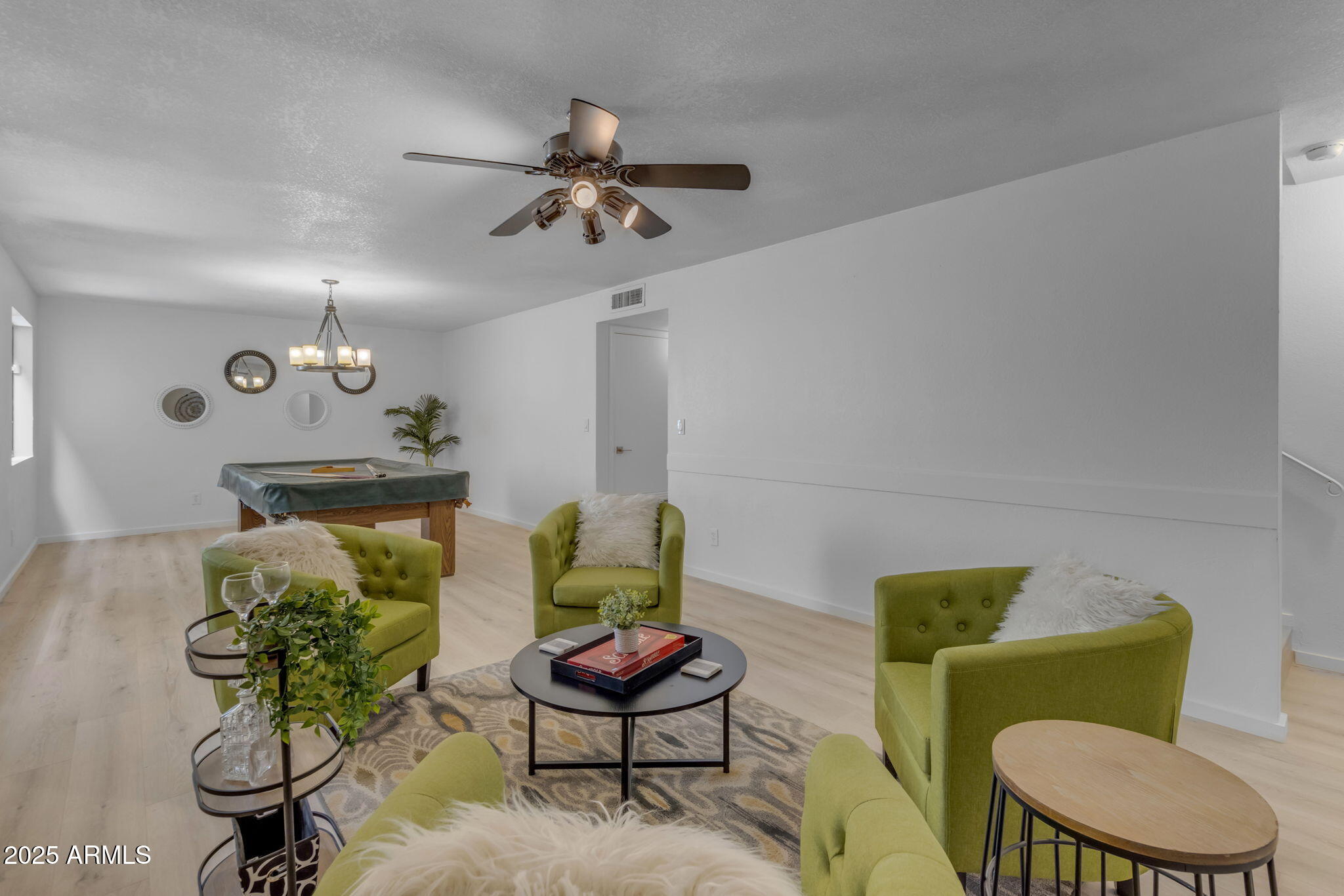 137 West Gary Way Gilbert, AZ 85233 - Photo 24 of 43 a living room with furniture and a wooden floor