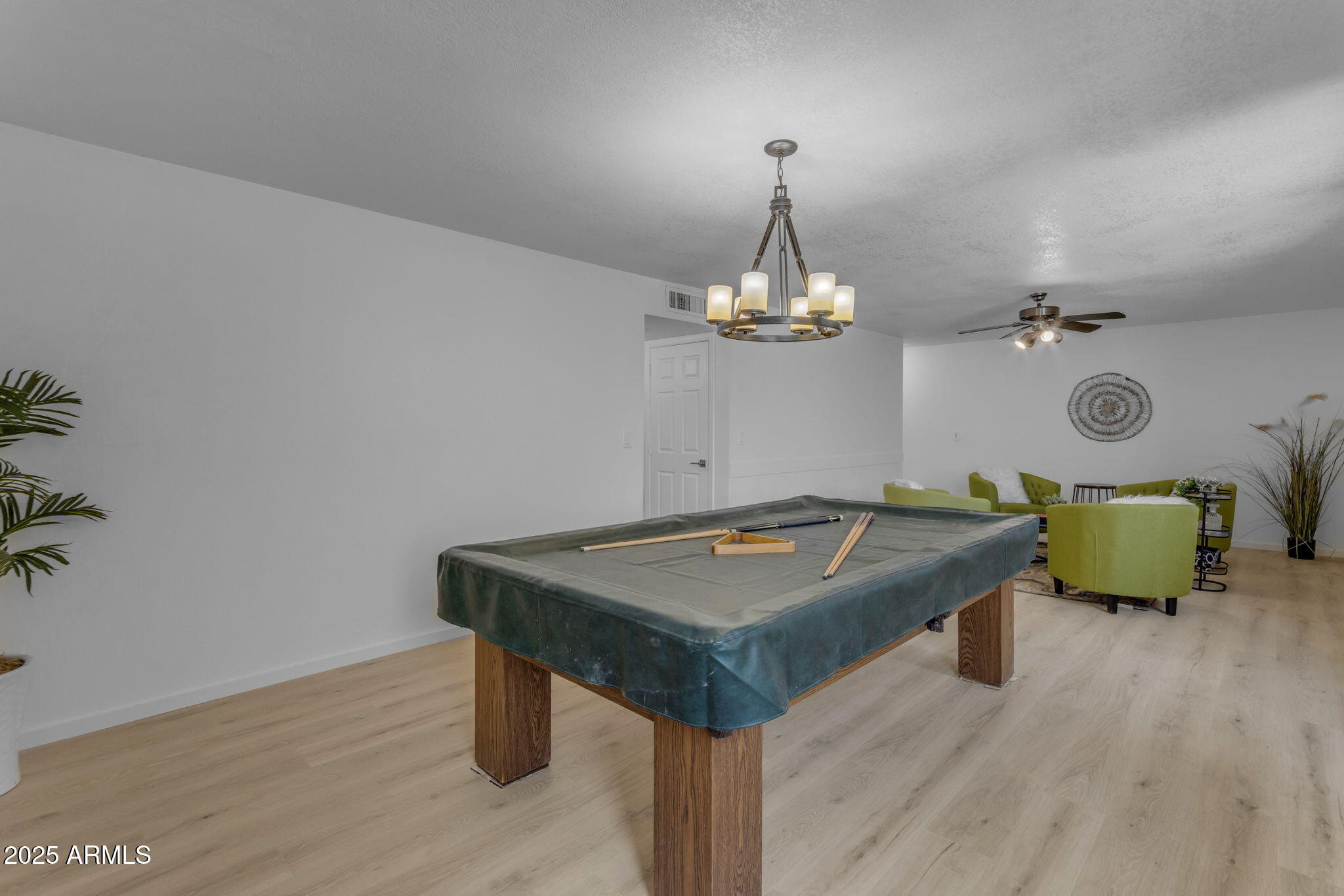 137 West Gary Way Gilbert, AZ 85233 - Photo 25 of 43 a room with pool table and wooden floor