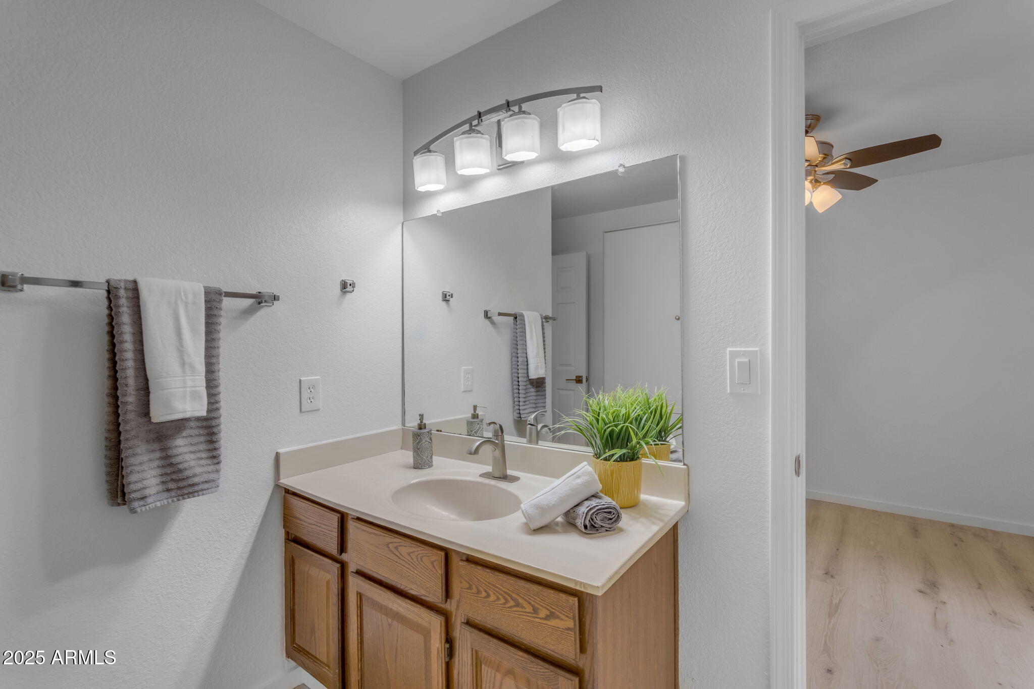 137 West Gary Way Gilbert, AZ 85233 - Photo 33 of 43 a bathroom with a sink and a mirror
