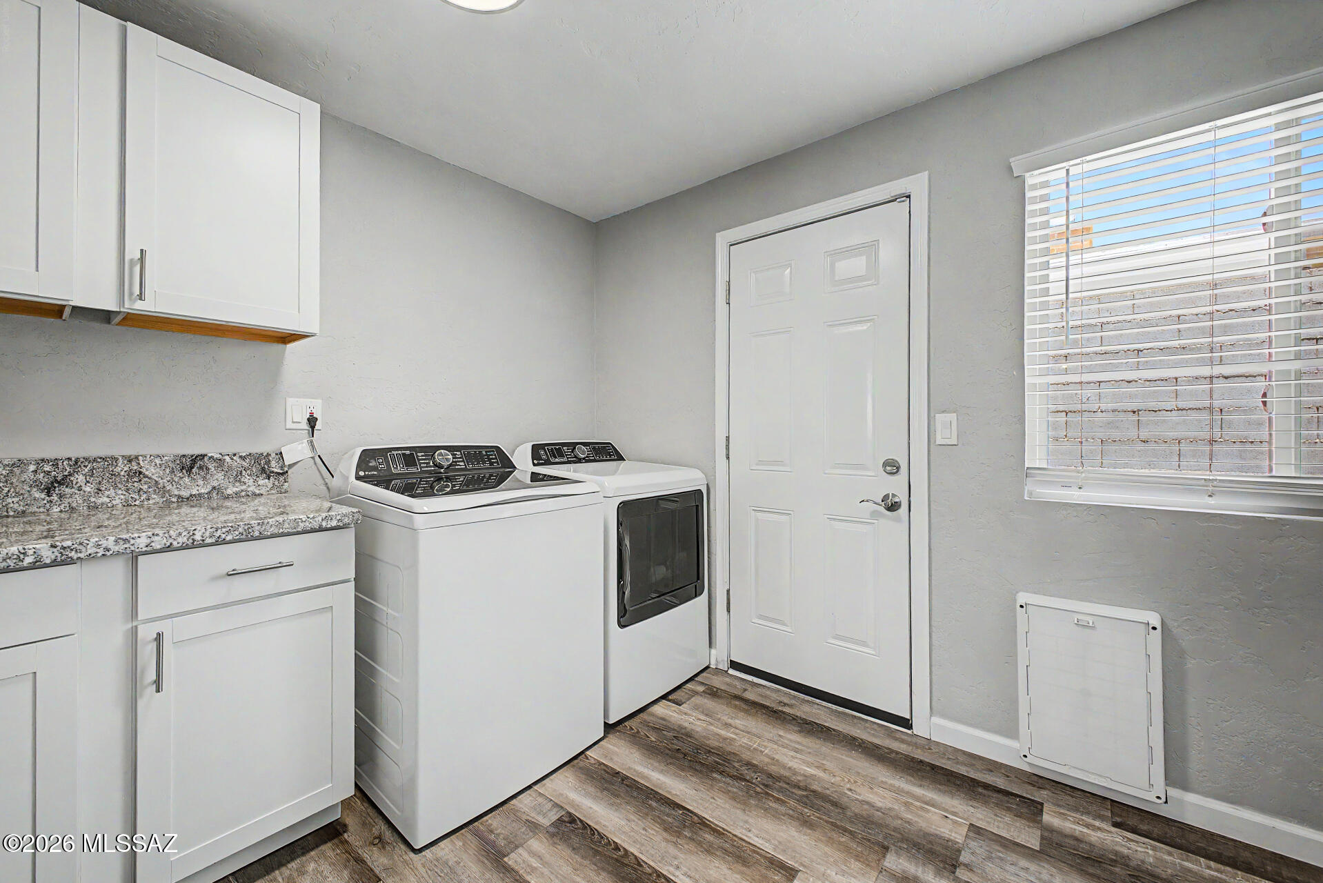 3249 South Serena Circle Tucson, AZ 85730 - Photo 25 of 27 Laundry room with outside access and access to bedroom # 5
