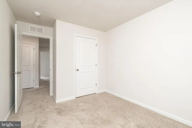 an empty room with a natural light