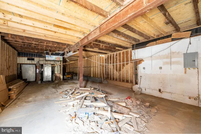a view of a room with outdoor seating space