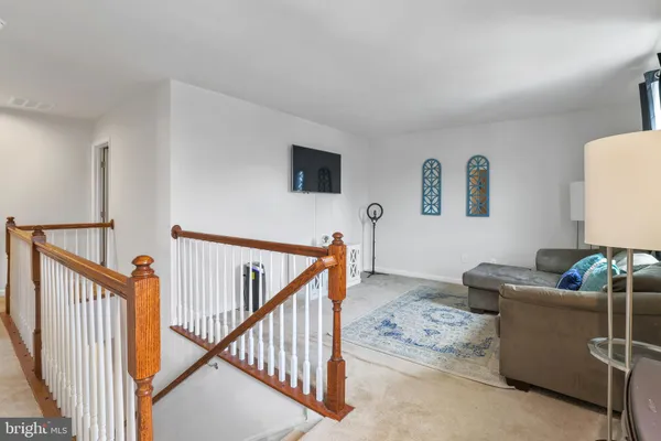 a view of a livingroom with furniture