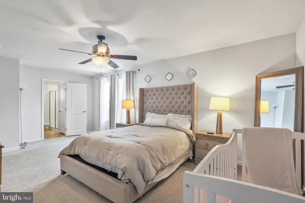 a view of a bedroom from a hallway