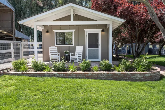 a view of outdoor space with wooden fence