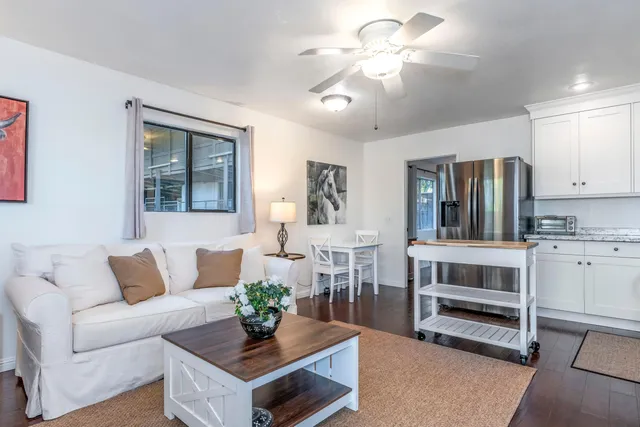 an aerial view of residential houses with outdoor space