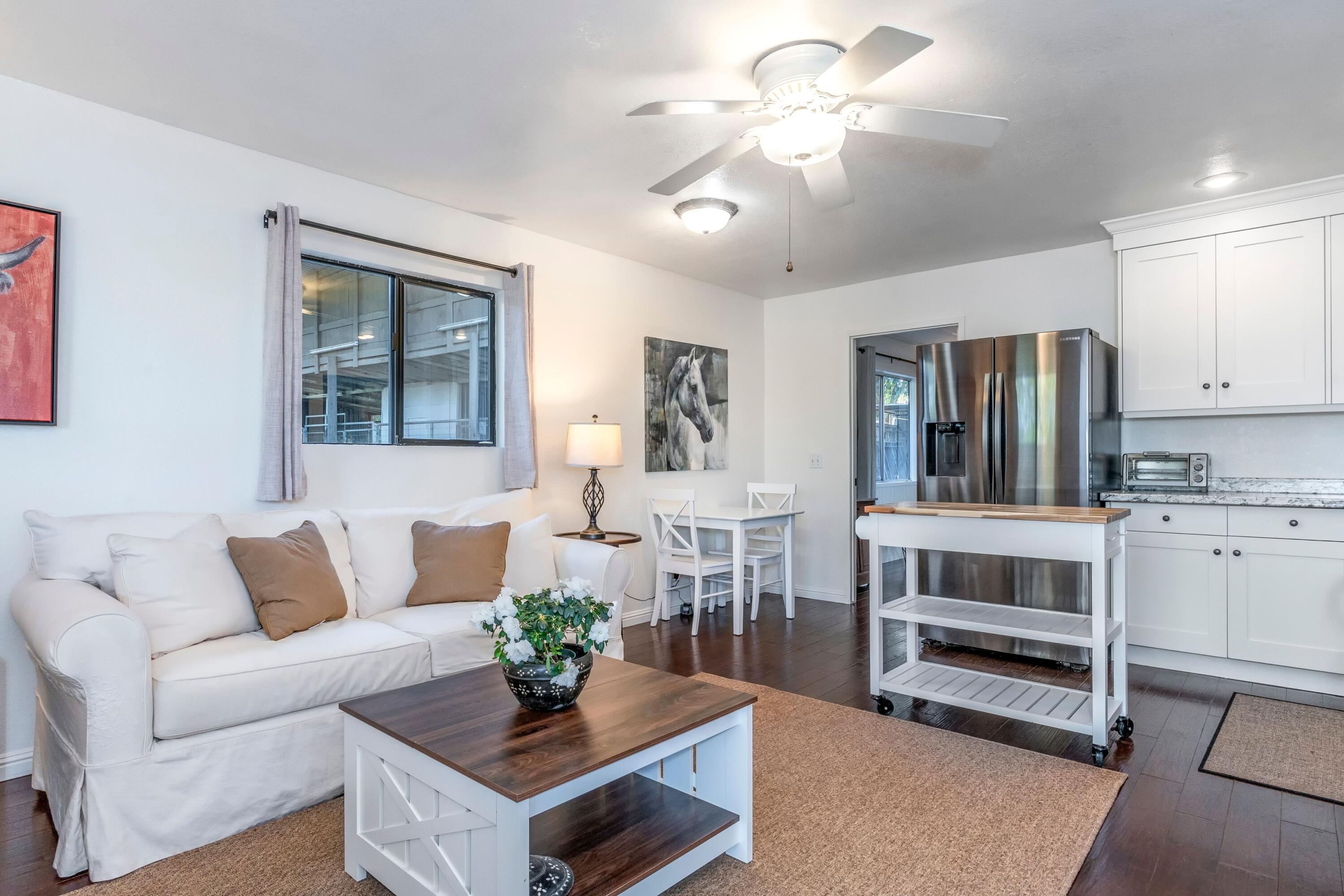 2921 Ontiveros Road Santa Ynez, CA 93460 - Photo 40 of 83 a living room with furniture and a chandelier