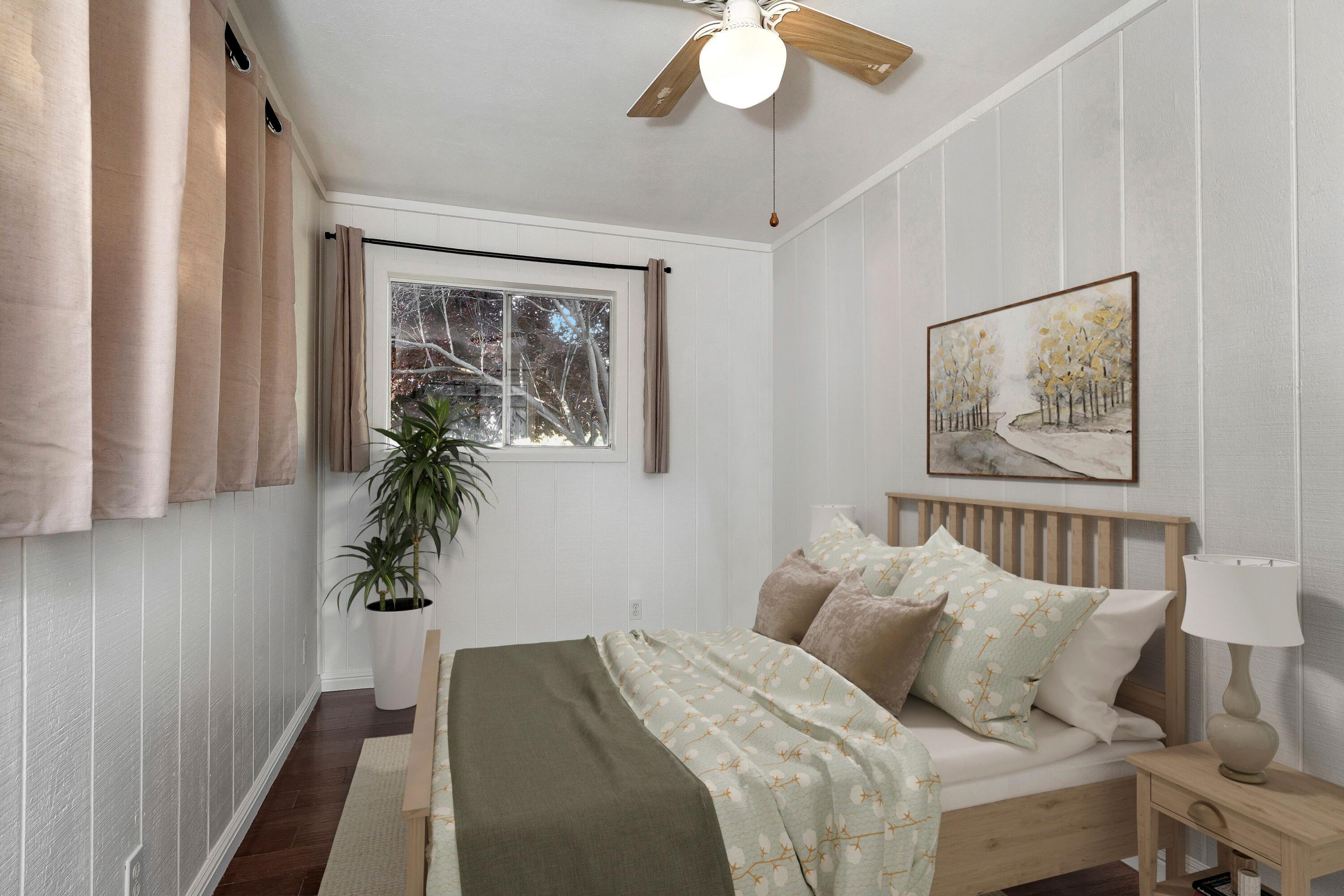 2921 Ontiveros Road Santa Ynez, CA 93460 - Photo 42 of 83 a bedroom with a large bed and a chandelier