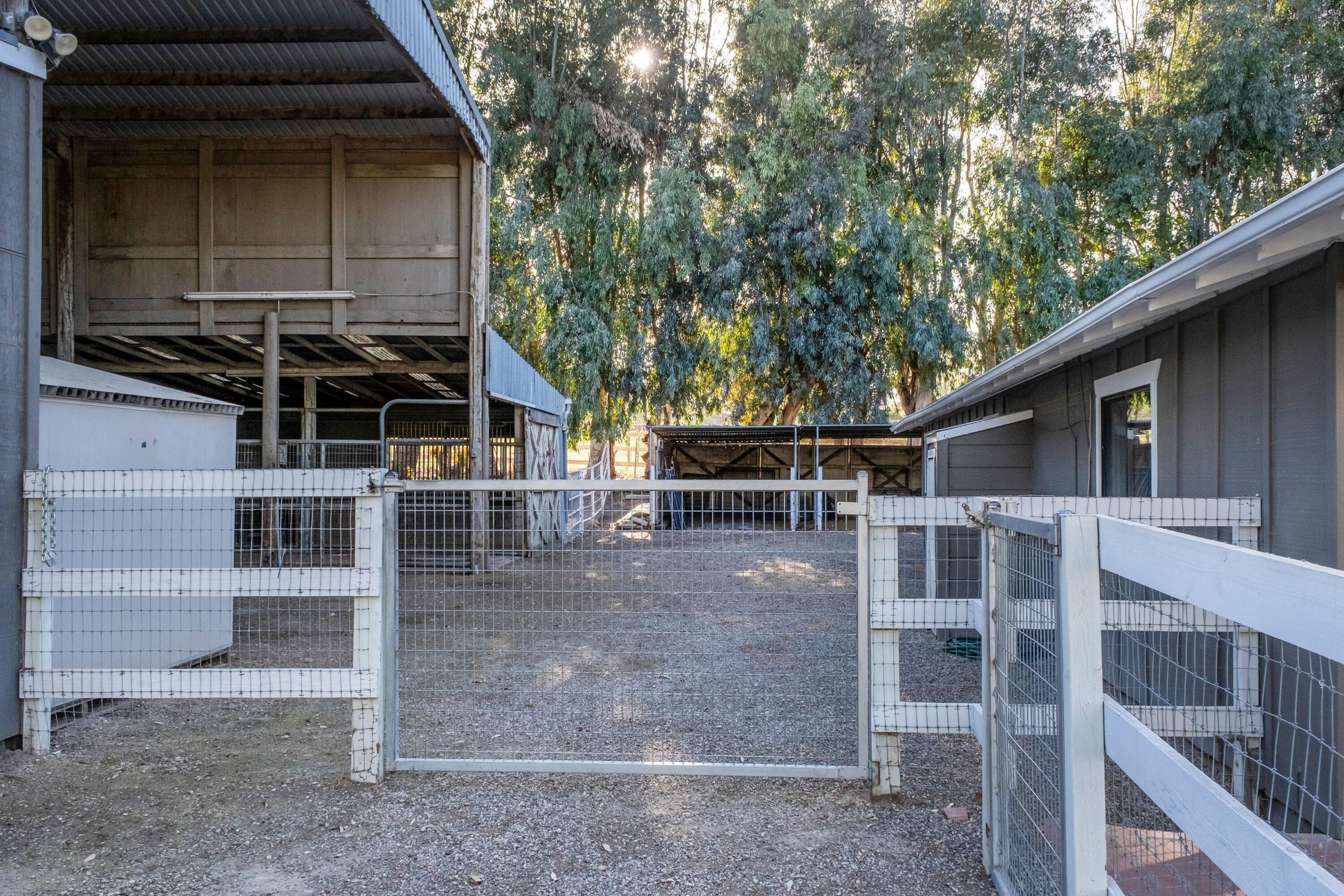 2921 Ontiveros Road Santa Ynez, CA 93460 - Photo 61 of 83 a view of a house with a window and wooden fence