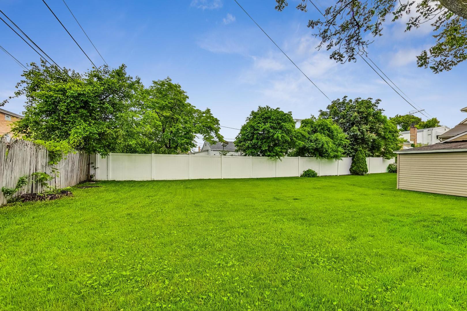 6730 West Dakin Street Chicago, IL 60634 - Photo 6 of 6 a view of a garden