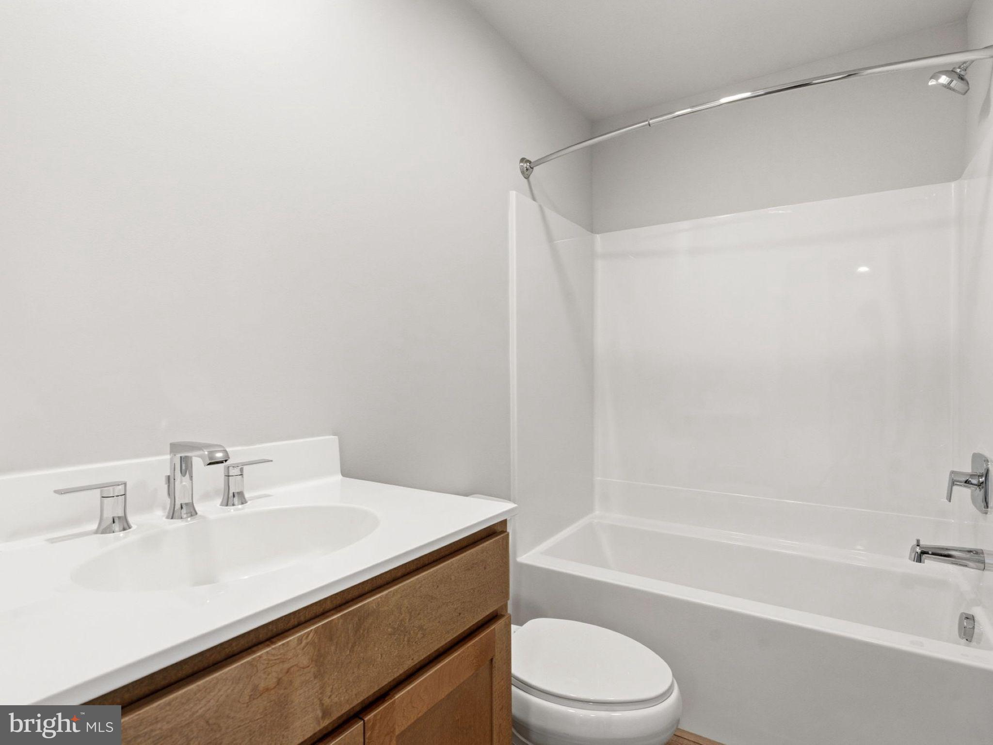 23 Snap Dragon Road Carlisle, PA 17015 - Photo 23 of 36 a bathroom with a sink toilet and bathtub