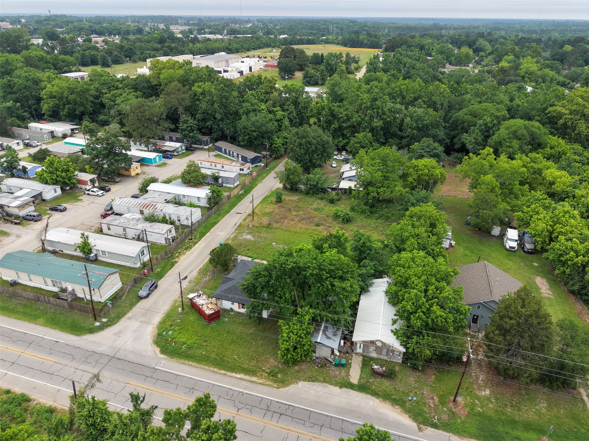 0 Mill Street Willis, TX 77378 - Photo 18 of 24 aerial view of a house with a yard and lake view