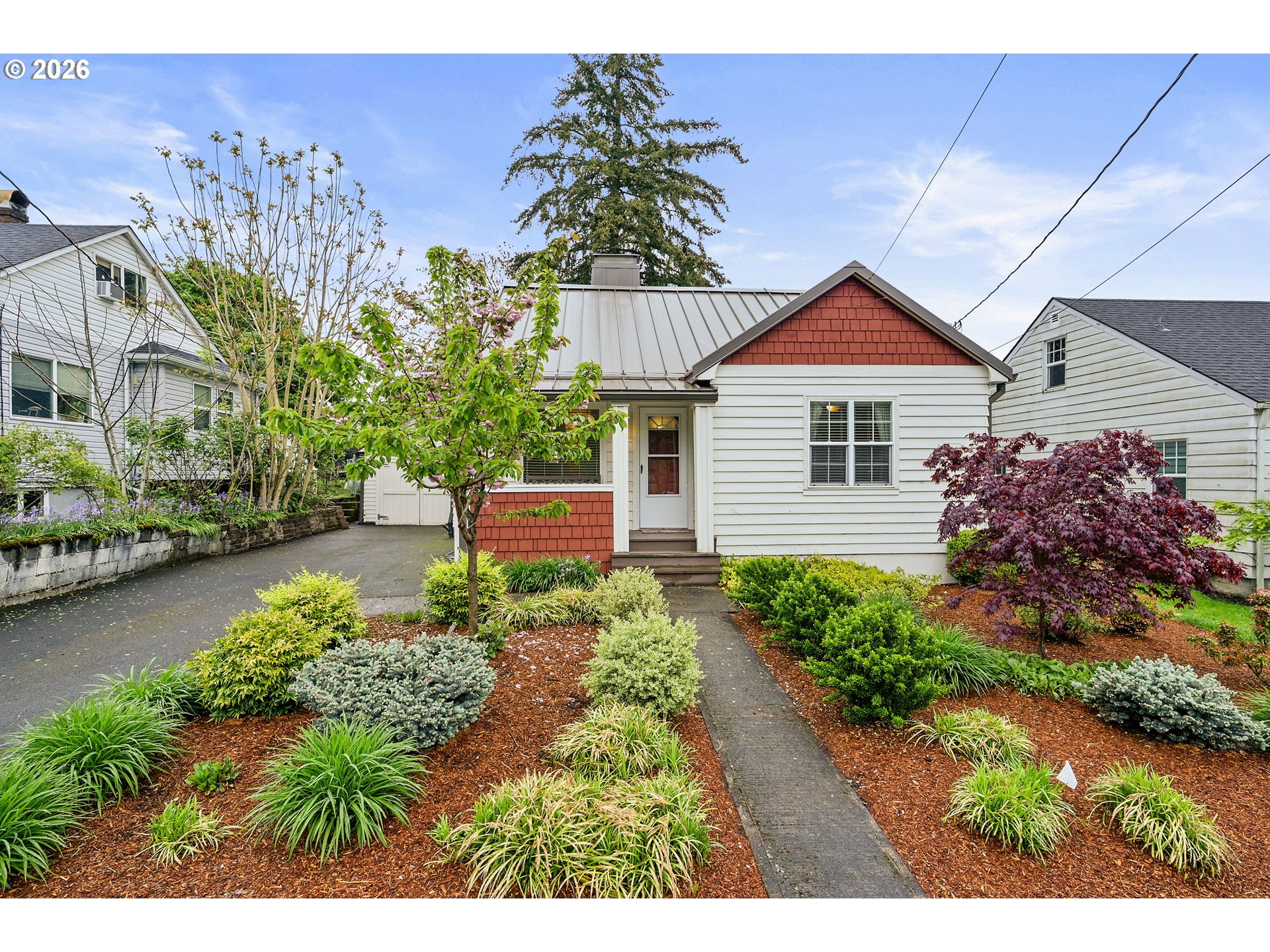 a view of a house with a garden