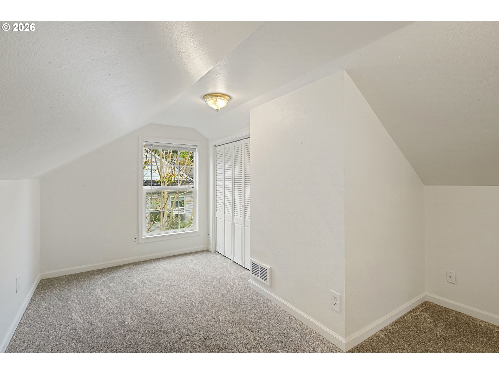 634 Northwest Ivy Street Camas, WA 98607 - Photo 12 of 27 a view of an empty room with a window