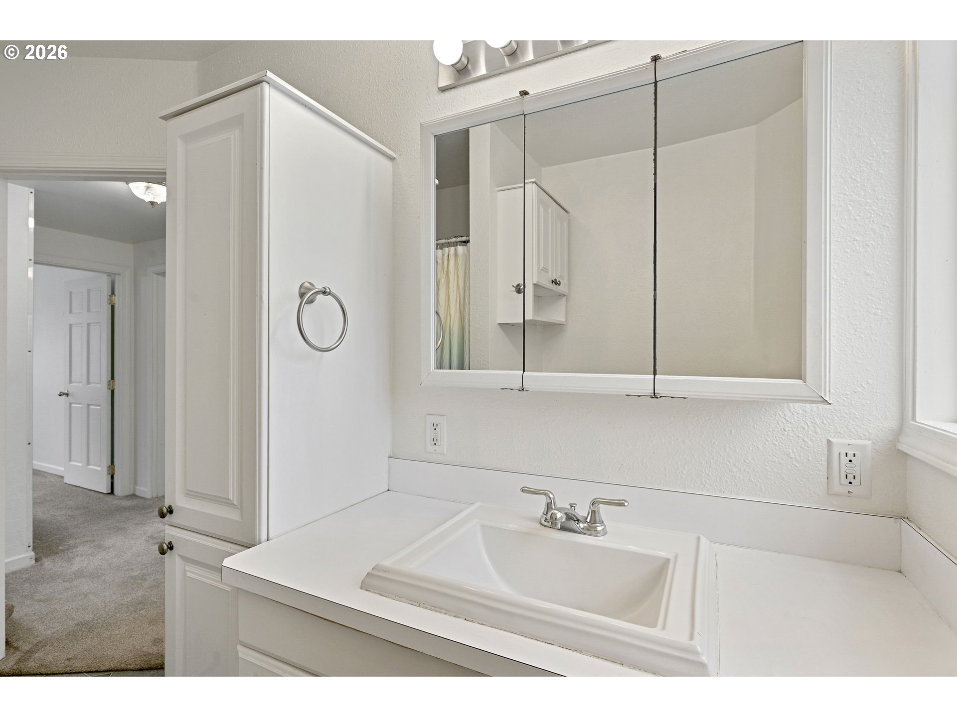 634 Northwest Ivy Street Camas, WA 98607 - Photo 14 of 27 a bathroom with a sink vanity and a mirror