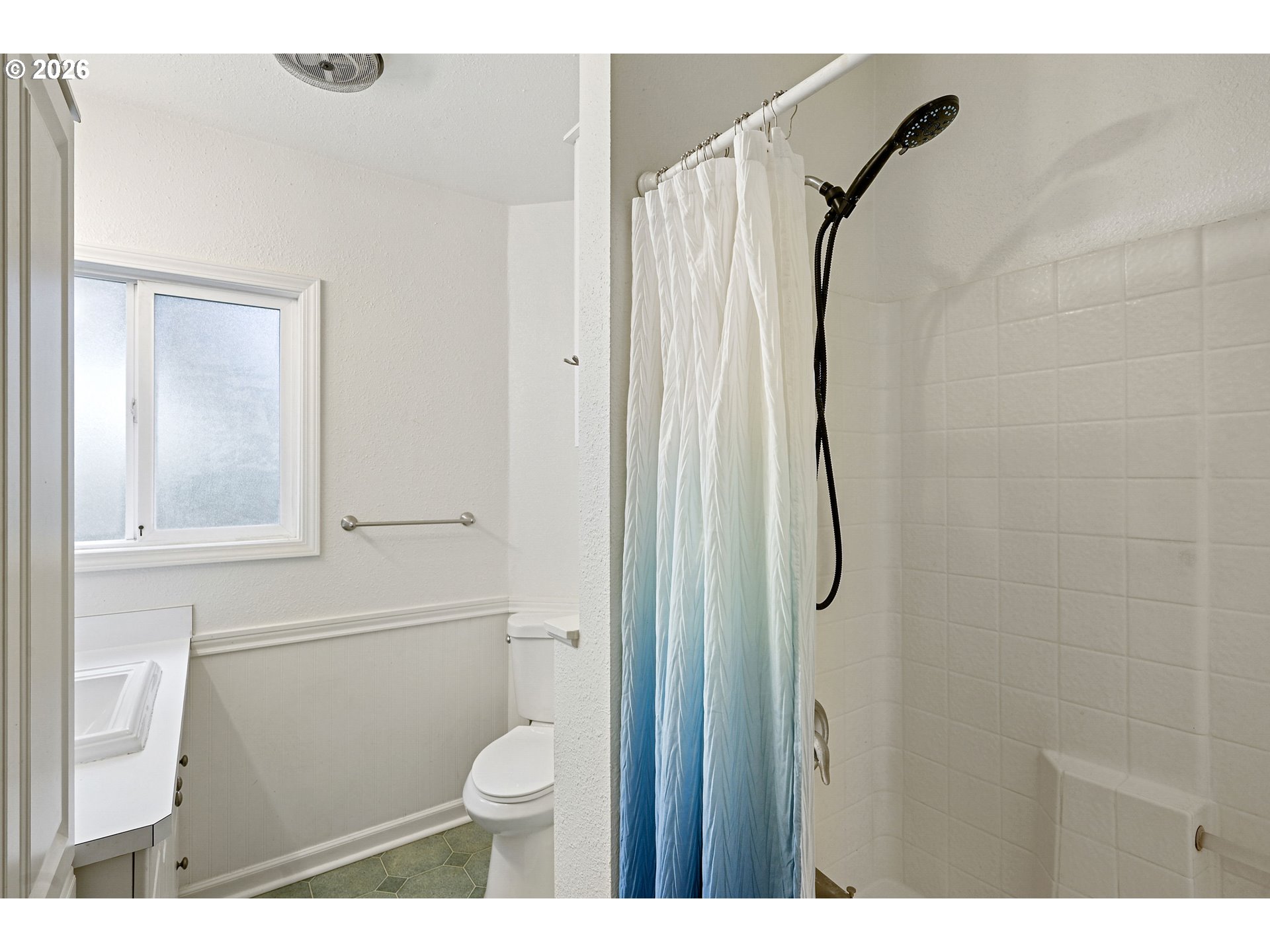 634 Northwest Ivy Street Camas, WA 98607 - Photo 15 of 27 a bathroom with a granite countertop toilet and a shower