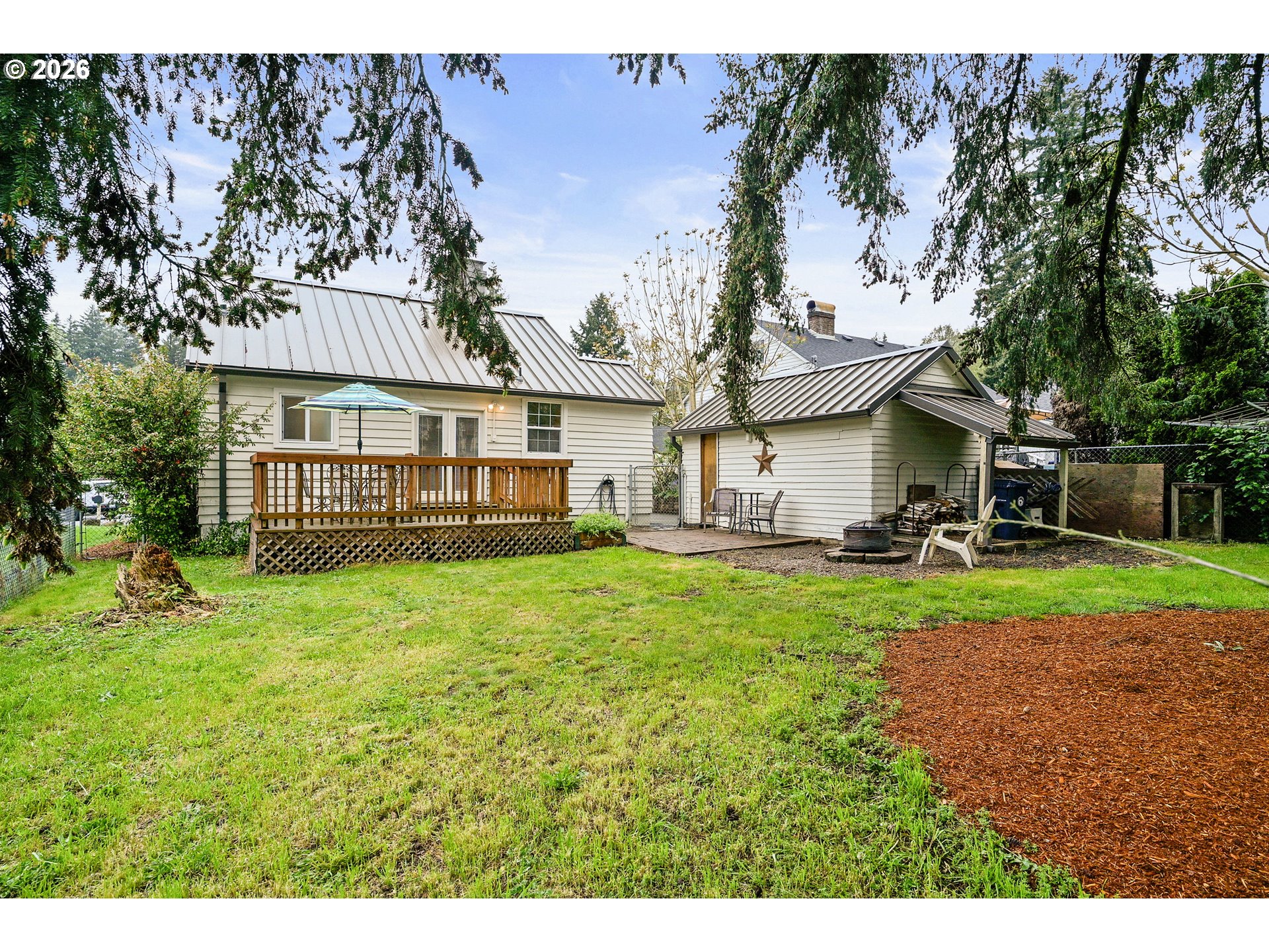 634 Northwest Ivy Street Camas, WA 98607 - Photo 25 of 27 a front view of a house with a yard table and chairs