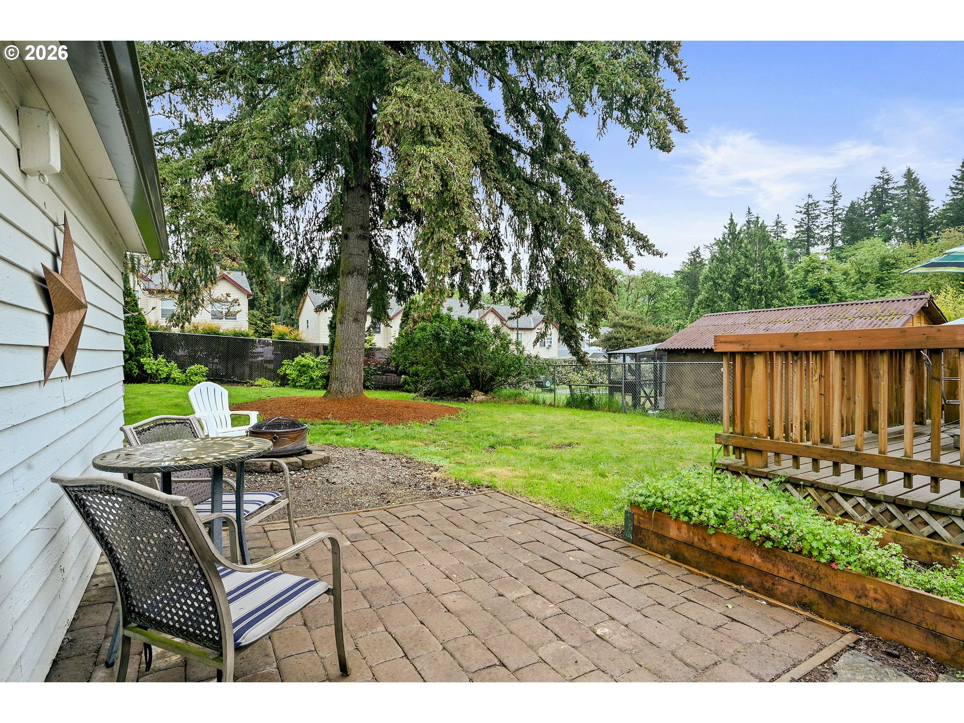 634 Northwest Ivy Street Camas, WA 98607 - Photo 26 of 27 a view of a backyard with sitting area