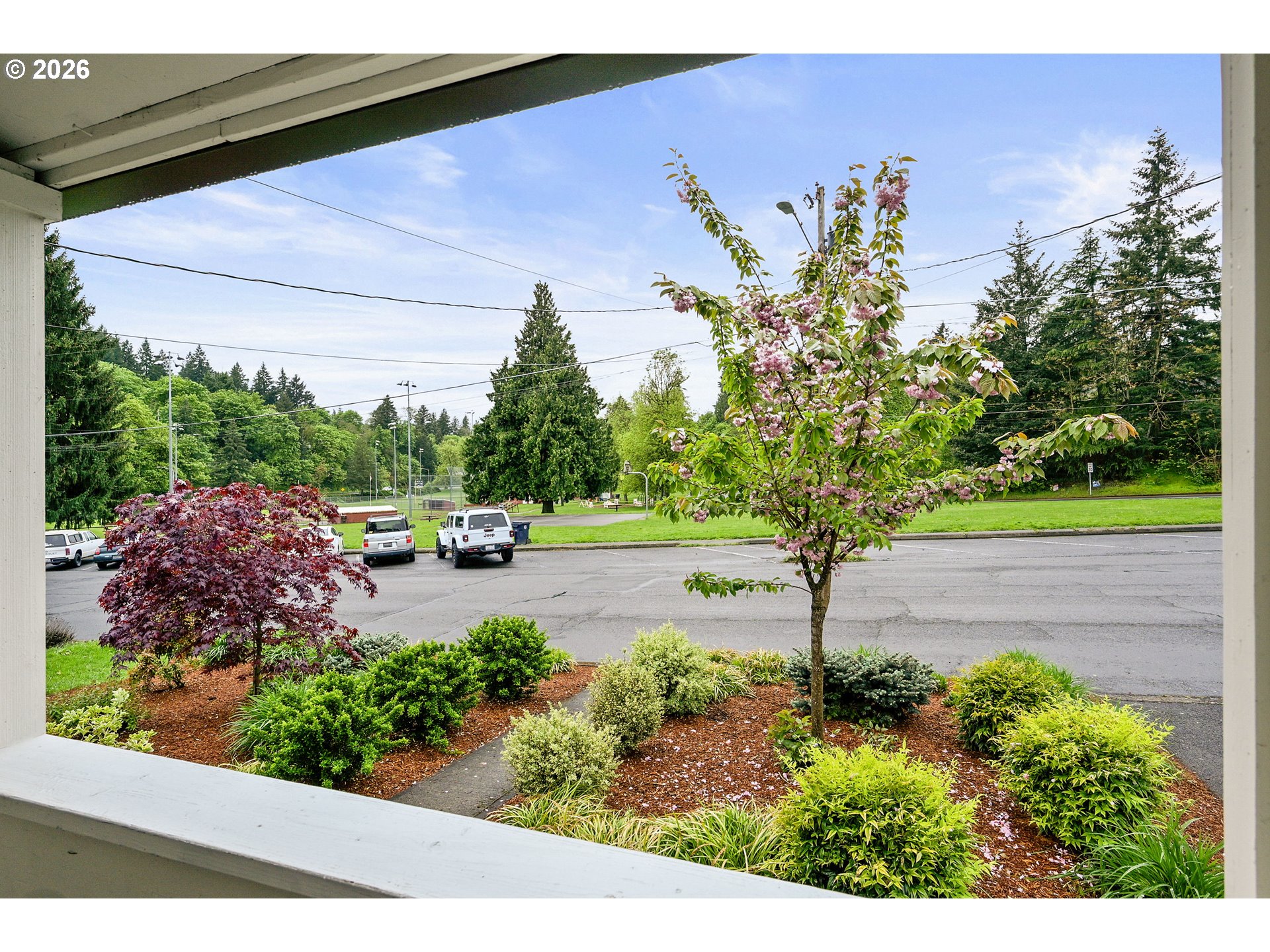 634 Northwest Ivy Street Camas, WA 98607 - Photo 3 of 27 a view of a yard with flower plants