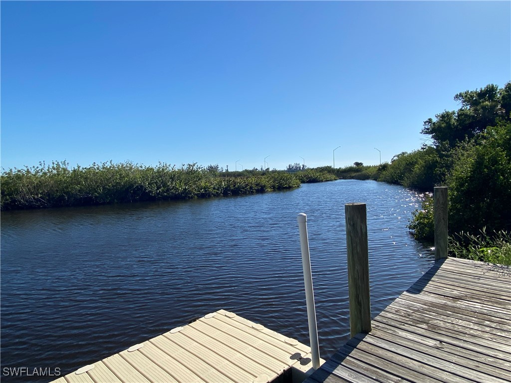 3250 Duncan Road Punta Gorda, FL 33982 - Photo 2 of 14 a view of a terrace with wooden floor and lake view