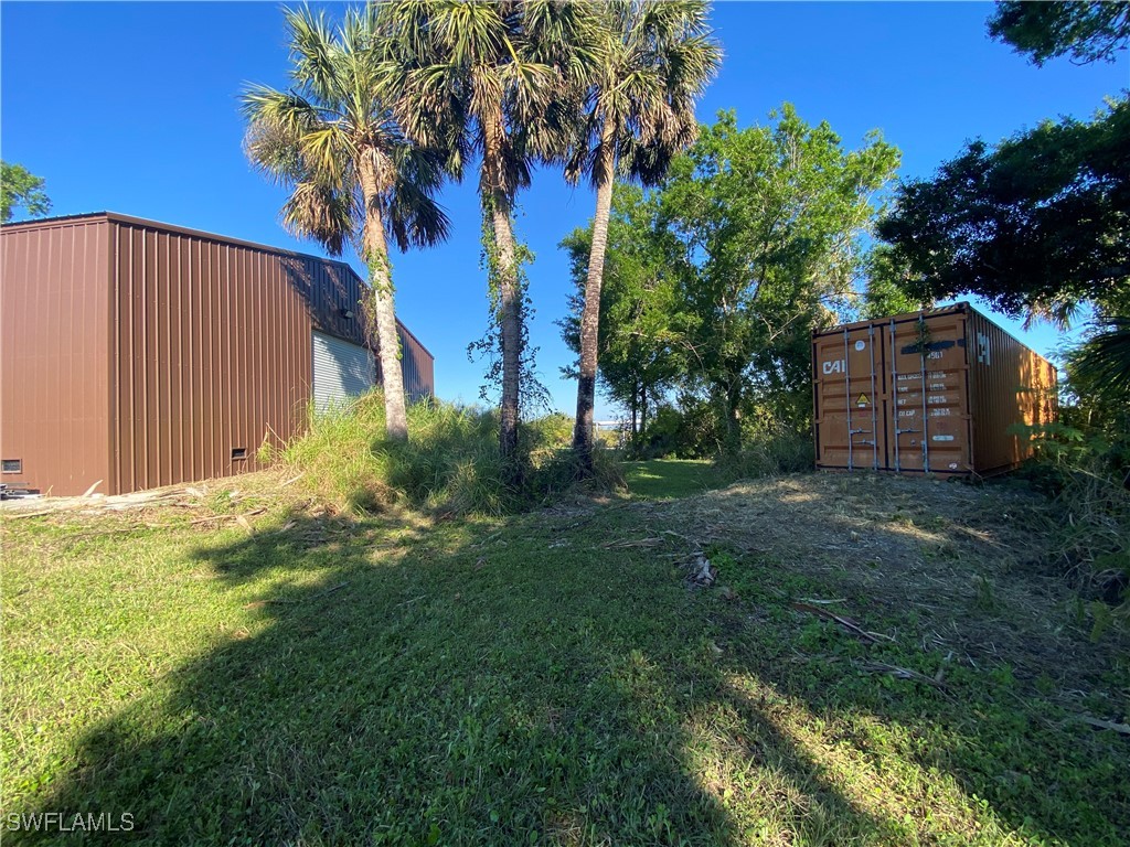 3250 Duncan Road Punta Gorda, FL 33982 - Photo 7 of 14 a view of a backyard