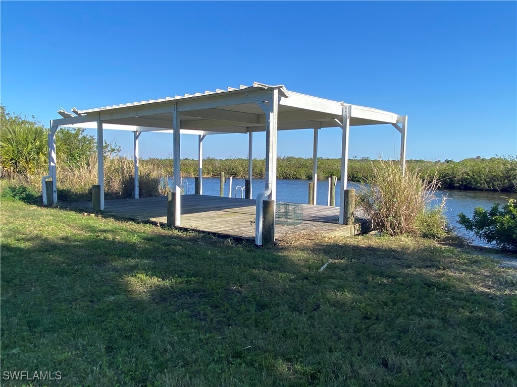 3250 Duncan Road Punta Gorda, FL 33982 - Photo 8 of 14 a view of a back yard of the house