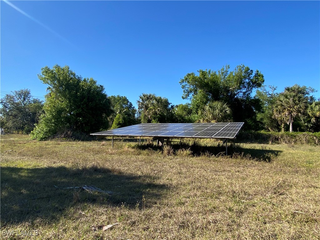 3250 Duncan Road Punta Gorda, FL 33982 - Photo 9 of 14 a view of a yard with wooden fence