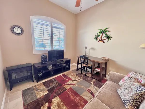 a living room with furniture and a window