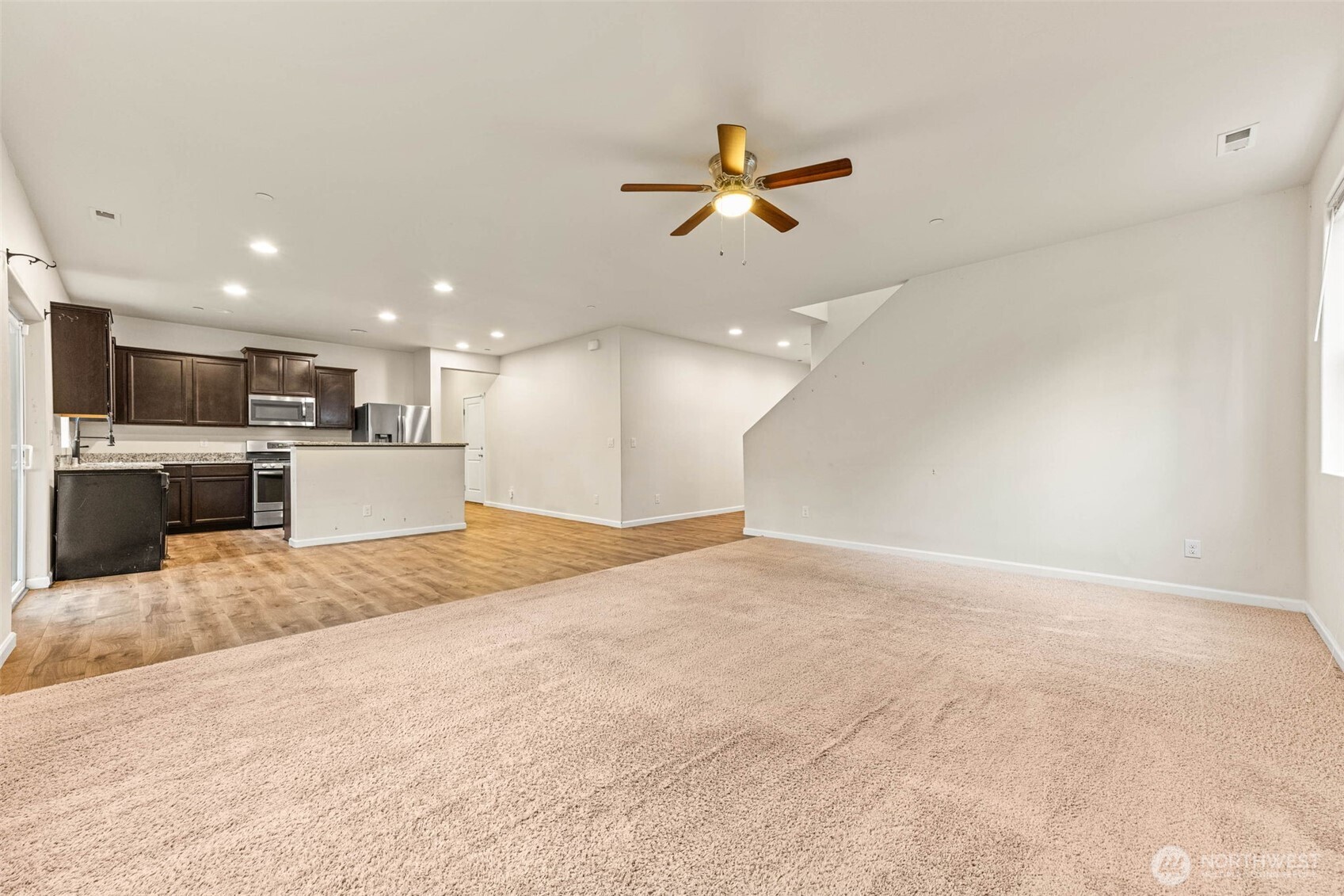 1705 Butler Court Northwest Olympia, WA 98502 - Photo 14 of 40 a view of a kitchen with a sink and a stove top oven