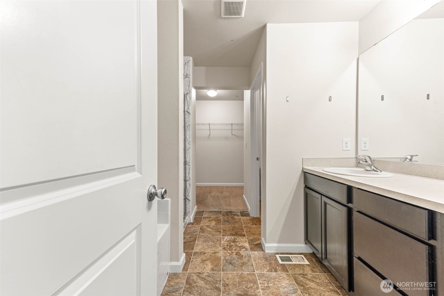 1705 Butler Court Northwest Olympia, WA 98502 - Photo 31 of 40 a bathroom with a sink and a mirror