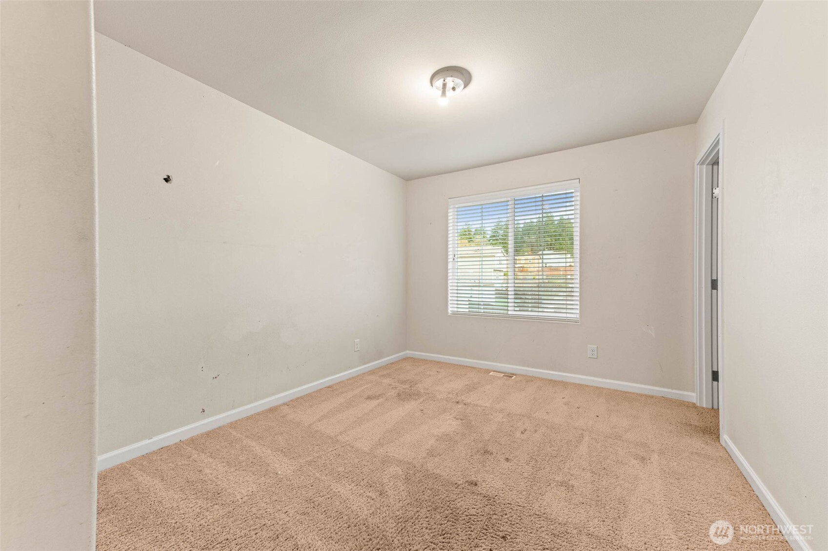 1705 Butler Court Northwest Olympia, WA 98502 - Photo 35 of 40 an empty room with windows