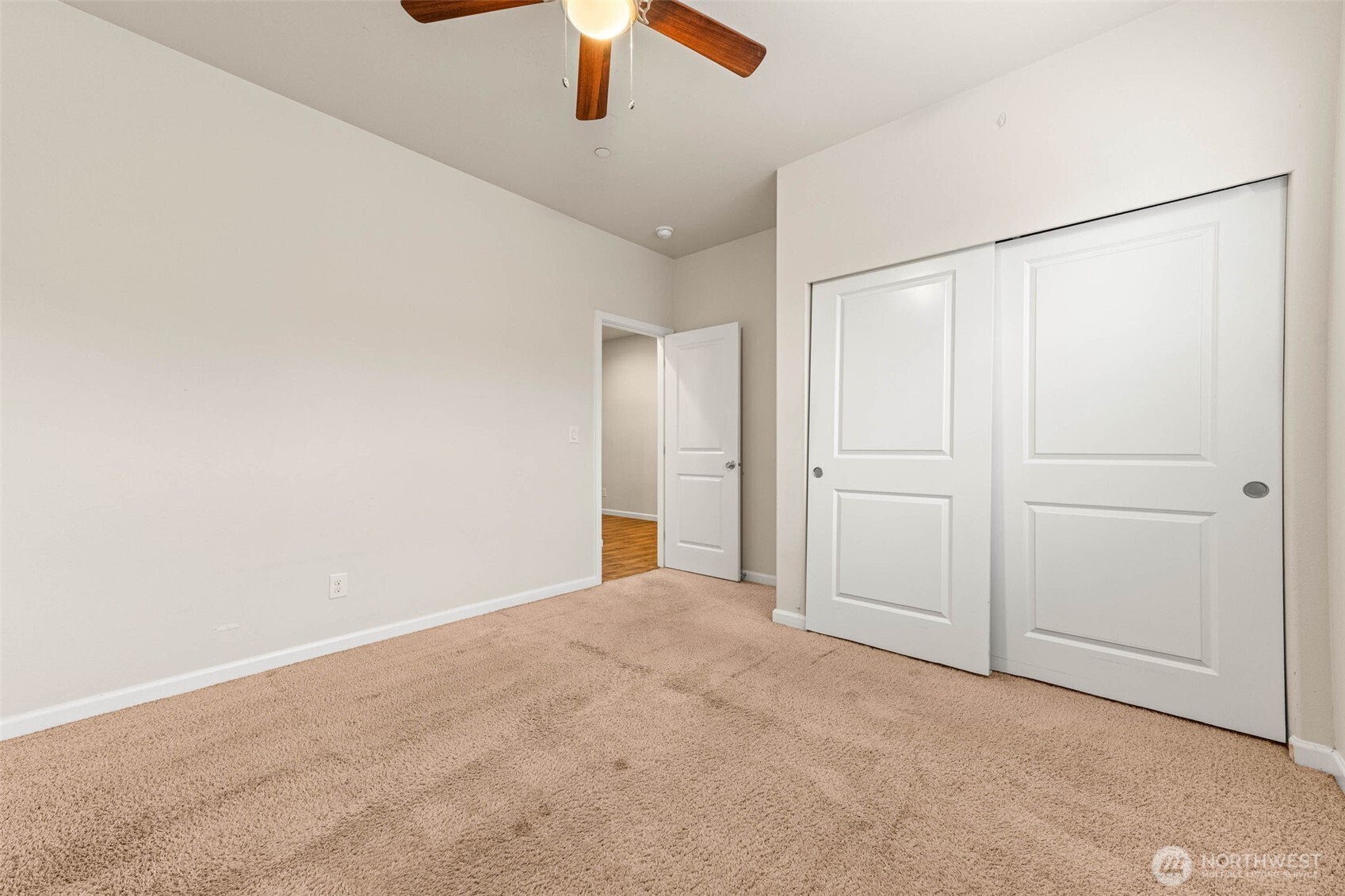 1705 Butler Court Northwest Olympia, WA 98502 - Photo 9 of 40 an empty room with chandelier fan