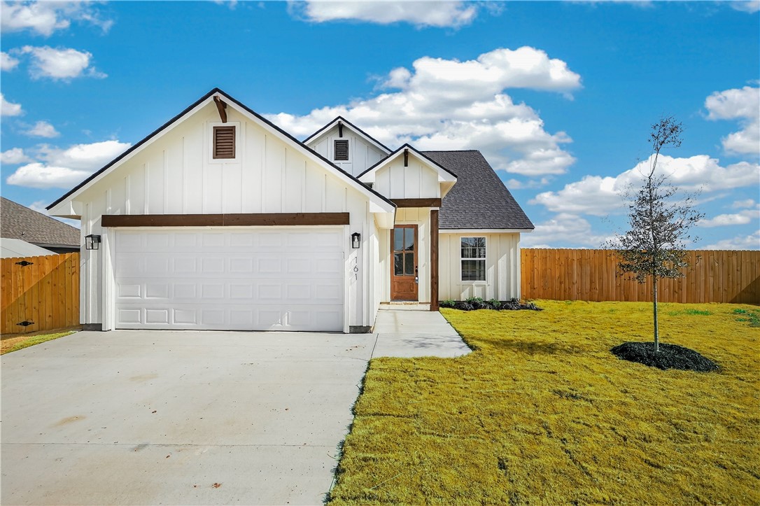 a view of a backyard of the house
