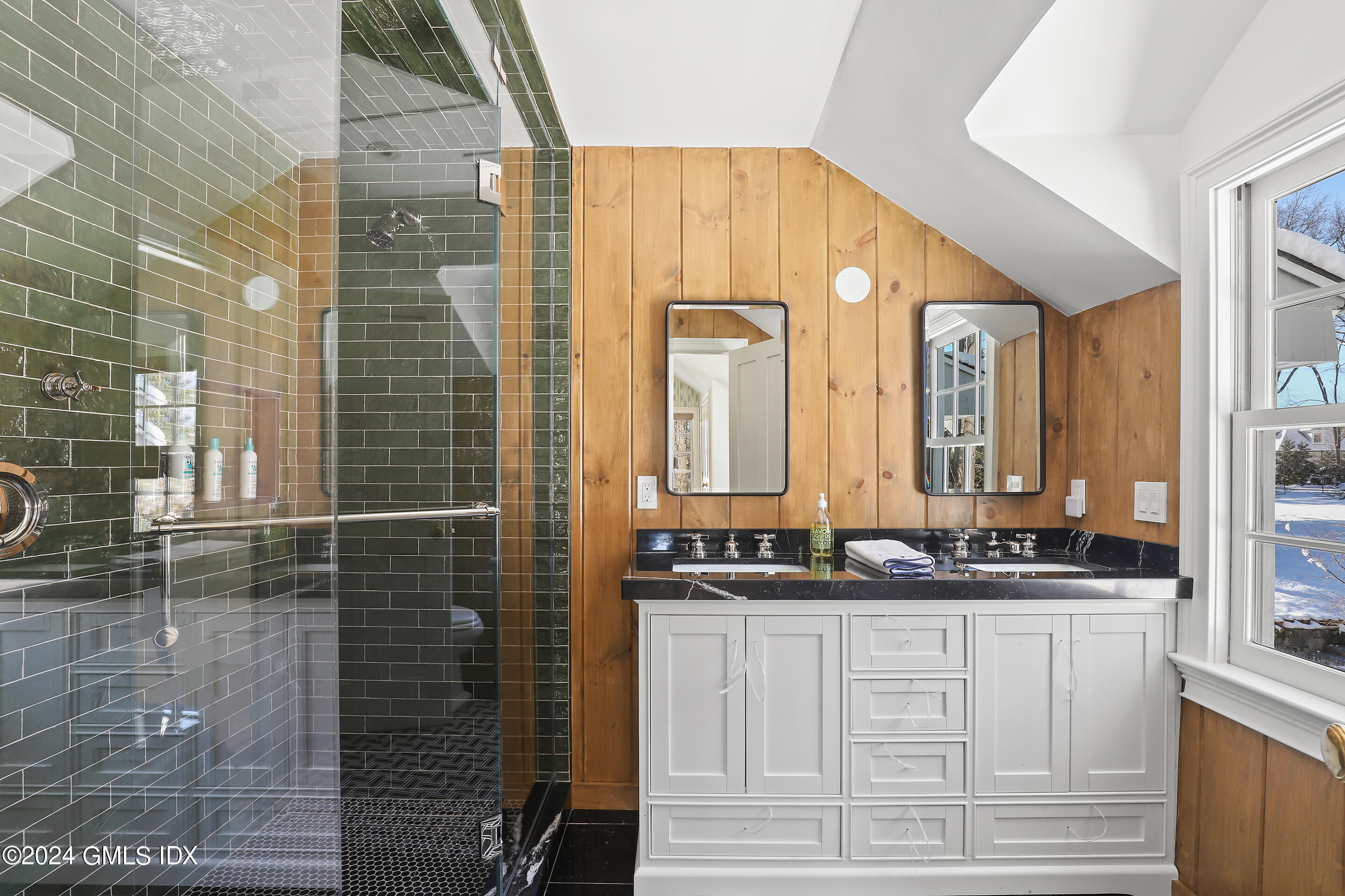 Undisclosed Address Greenwich, CT 06830 - Photo 15 of 19 a bathroom with a double vanity sink and a mirror