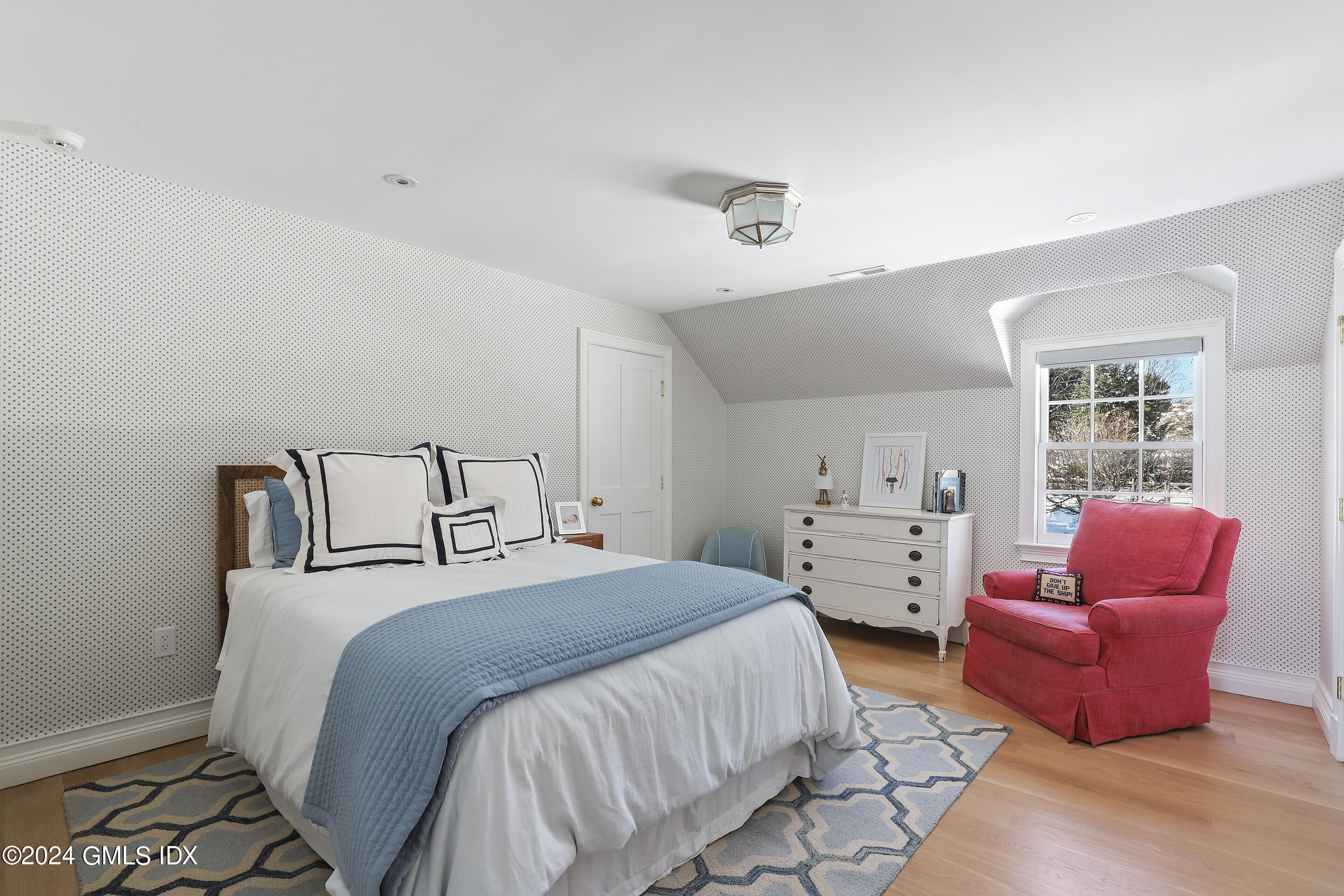 Undisclosed Address Greenwich, CT 06830 - Photo 16 of 19 a spacious bedroom with a bed and furniture