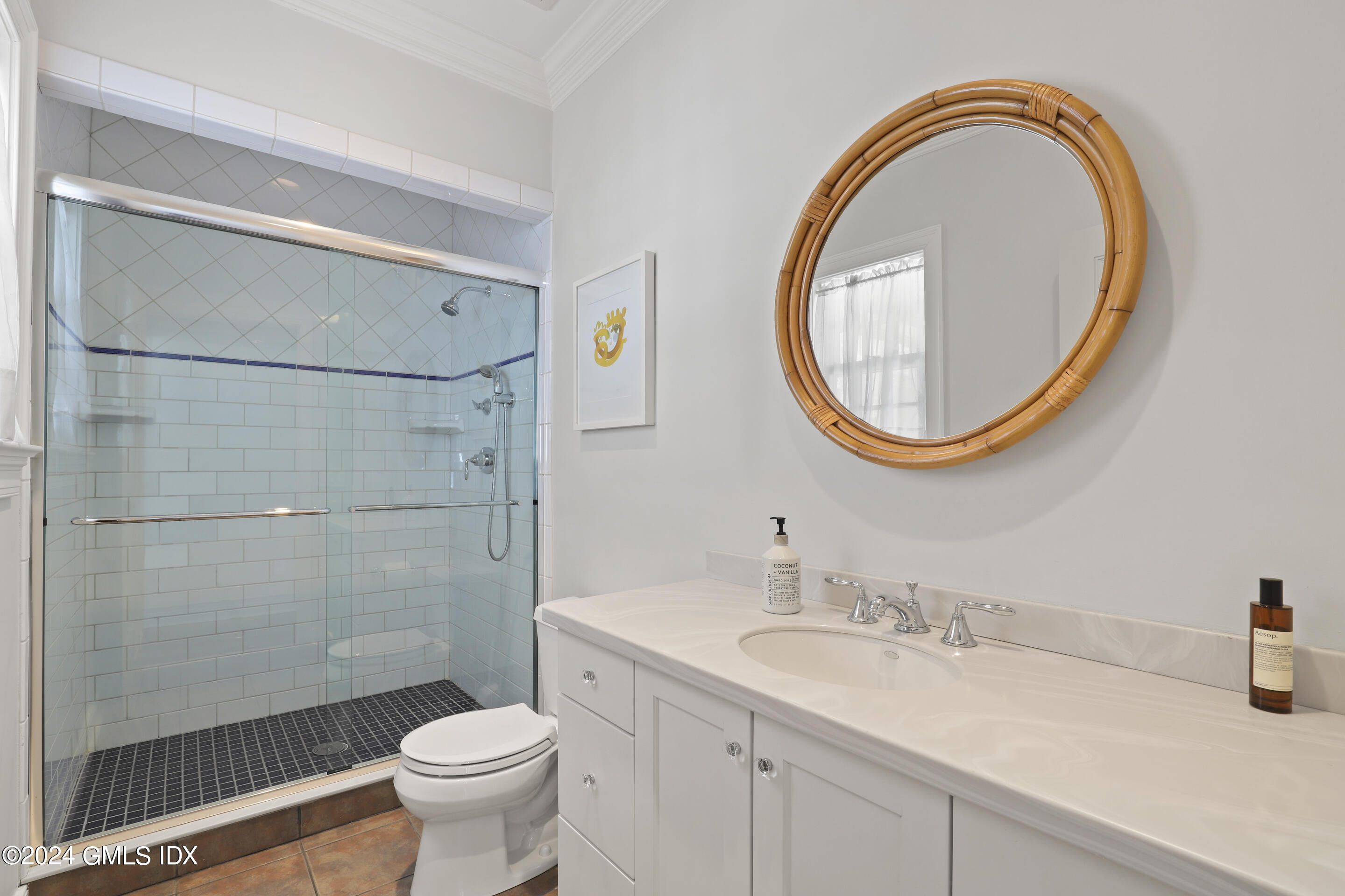 Undisclosed Address Greenwich, CT 06830 - Photo 19 of 19 a bathroom with a sink a toilet and a mirror