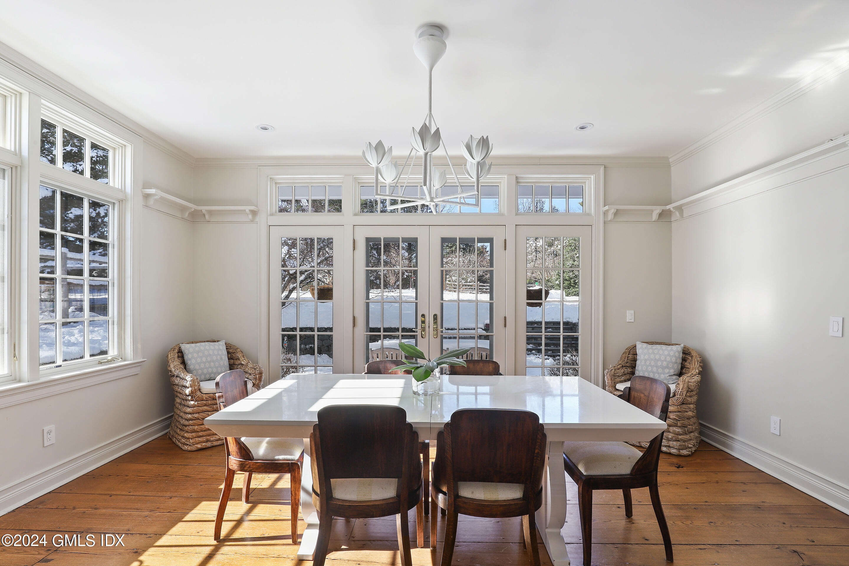 Undisclosed Address Greenwich, CT 06830 - Photo 5 of 19 a view of a dining room with furniture window and outside view