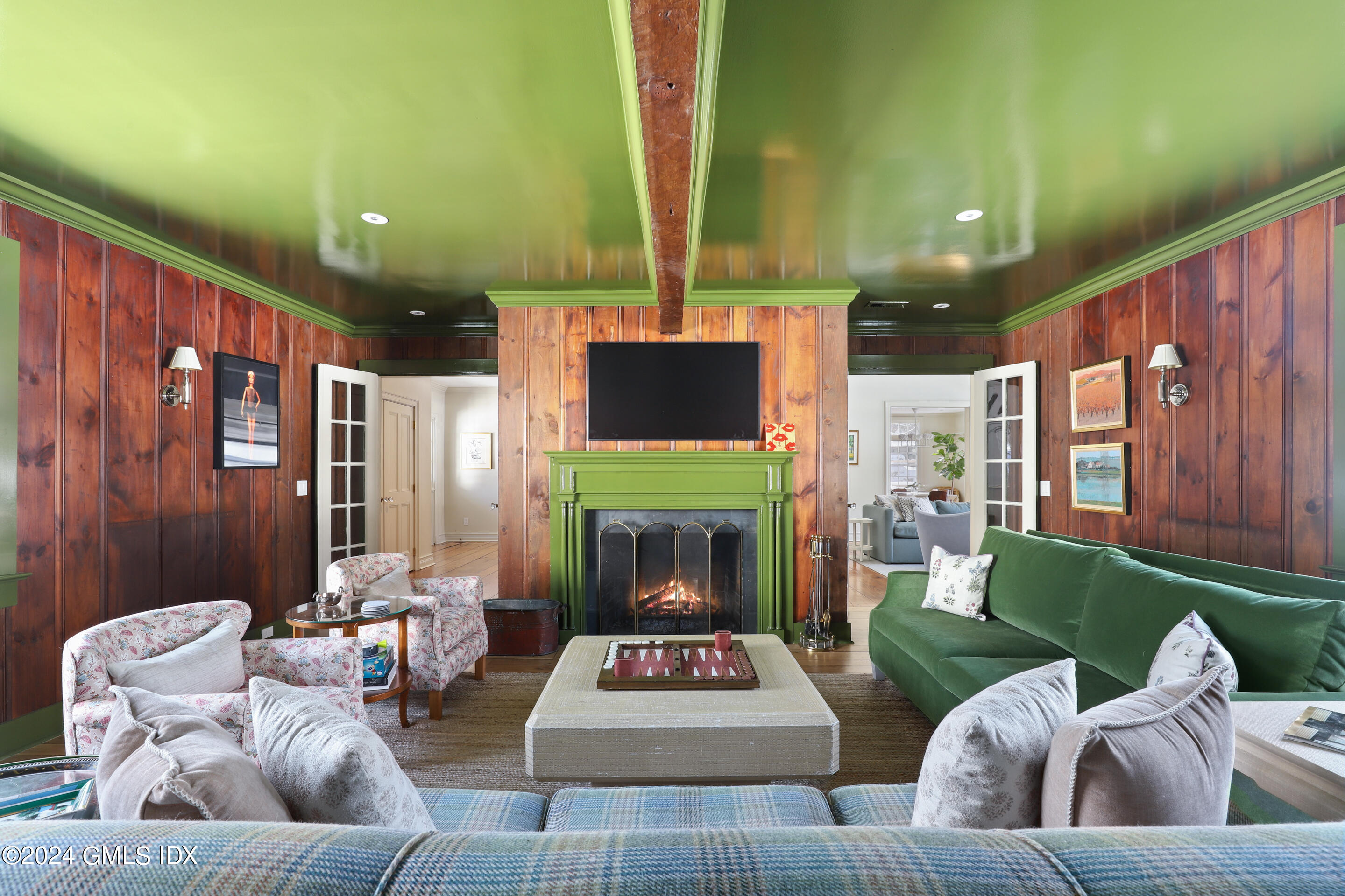 Undisclosed Address Greenwich, CT 06830 - Photo 8 of 19 a living room with furniture and a fireplace