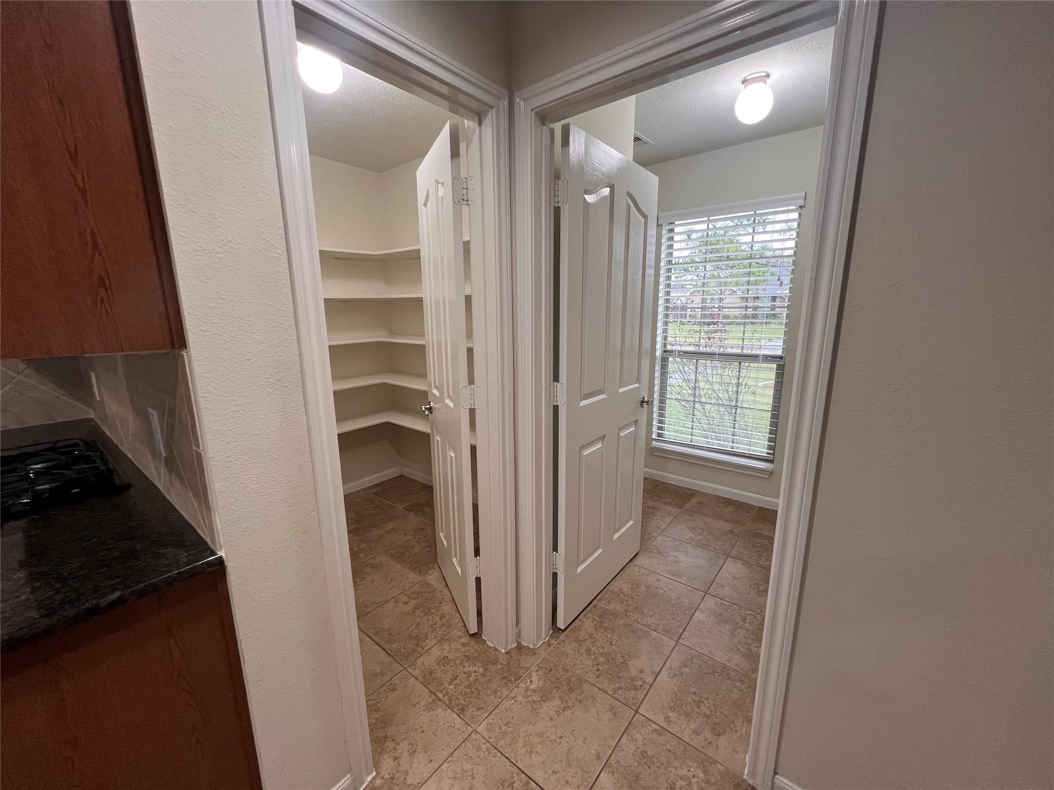 2502 Redrock Road League City, TX 77573 - Photo 4 of 19 You'll love the convince of having a corner pantry and an extra large unity room.