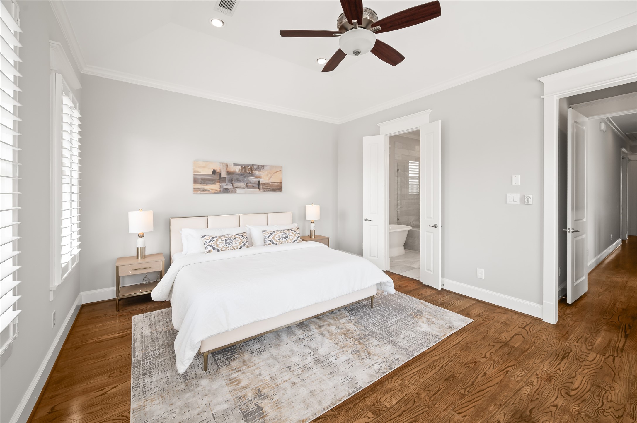 1003 East 25th Street Houston, TX 77009 - Photo 20 of 32 Large enough for a king-sized bed, this primary suite is perfect for relaxation and rest.