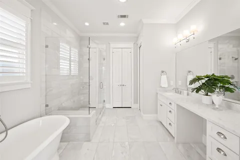 a white sink sitting next to a white sink