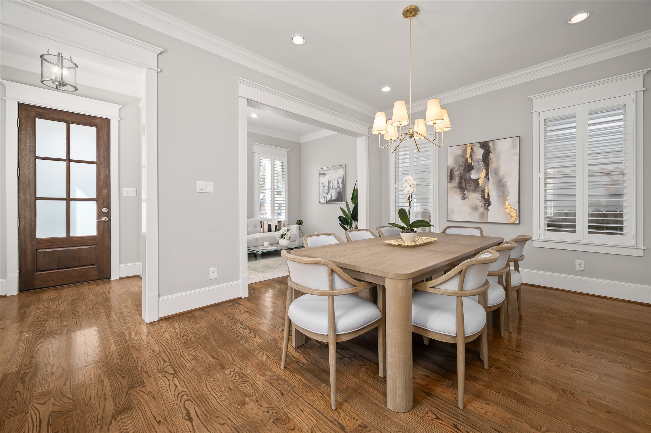1003 East 25th Street Houston, TX 77009 - Photo 8 of 32 Seamless flow between dining room and den makes entertaining effortless.