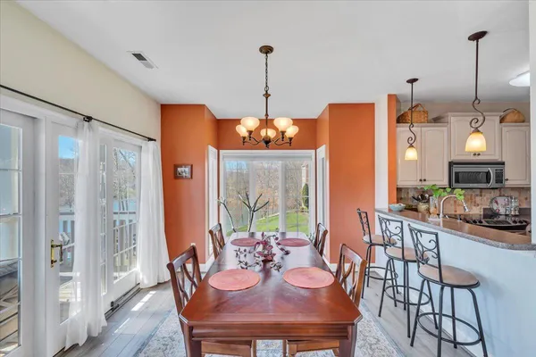 a bedroom with furniture and window