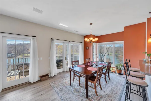 a bedroom with a bed and a dresser in it