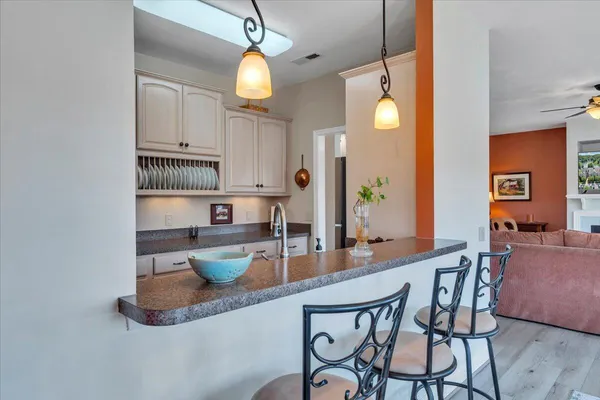 a view of balcony with furniture