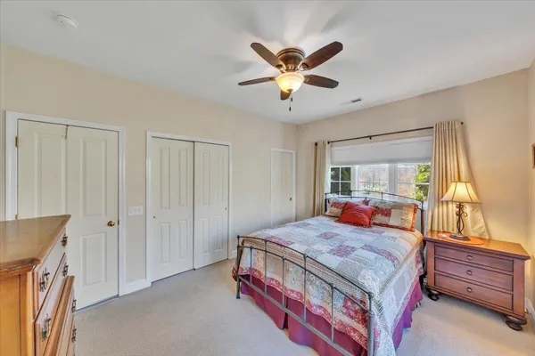 an aerial view of lake residential houses with outdoor space and swimming pool