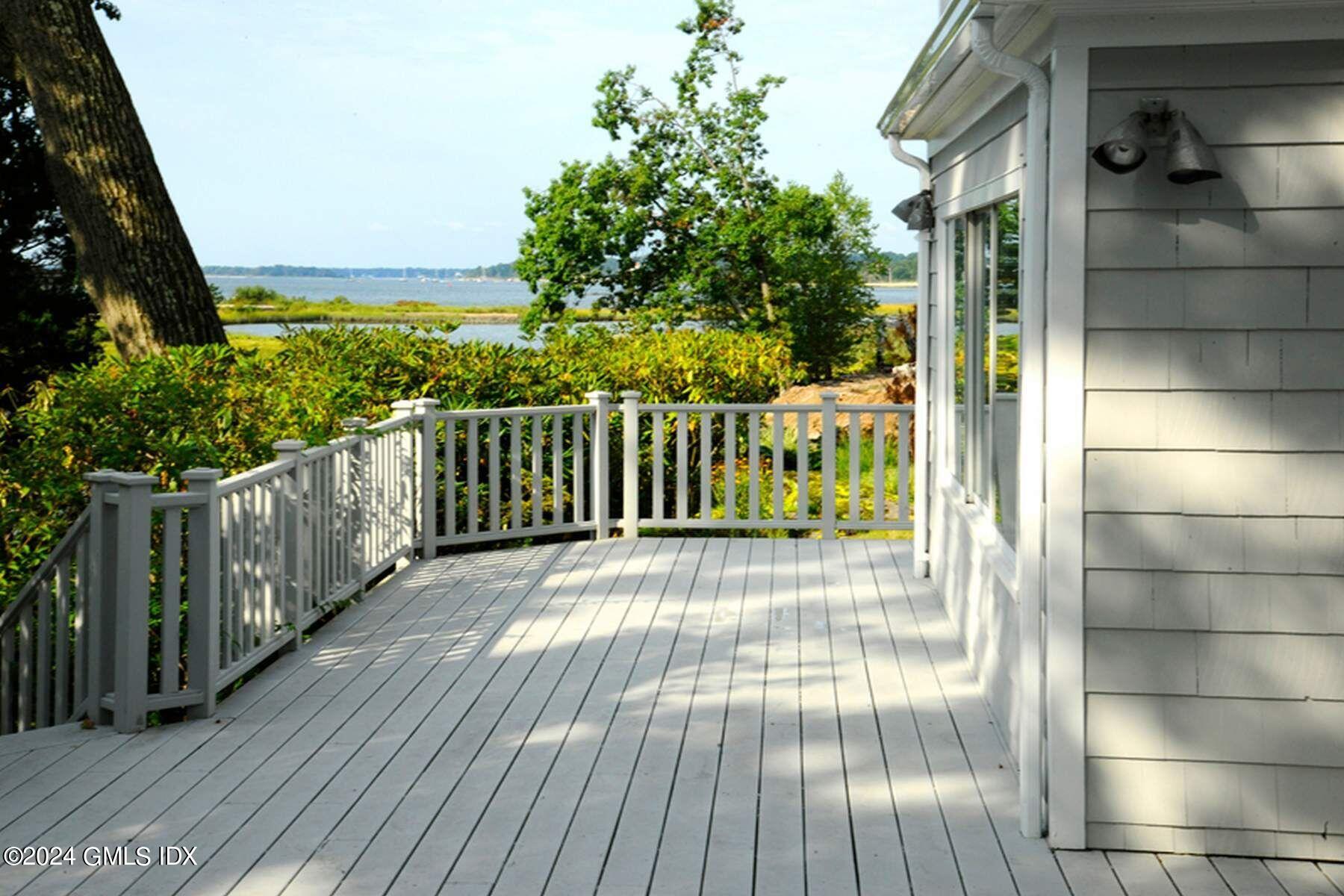 8 Indian Point Lane Riverside, CT 06878 - Photo 18 of 18 a view of a balcony with wooden floor
