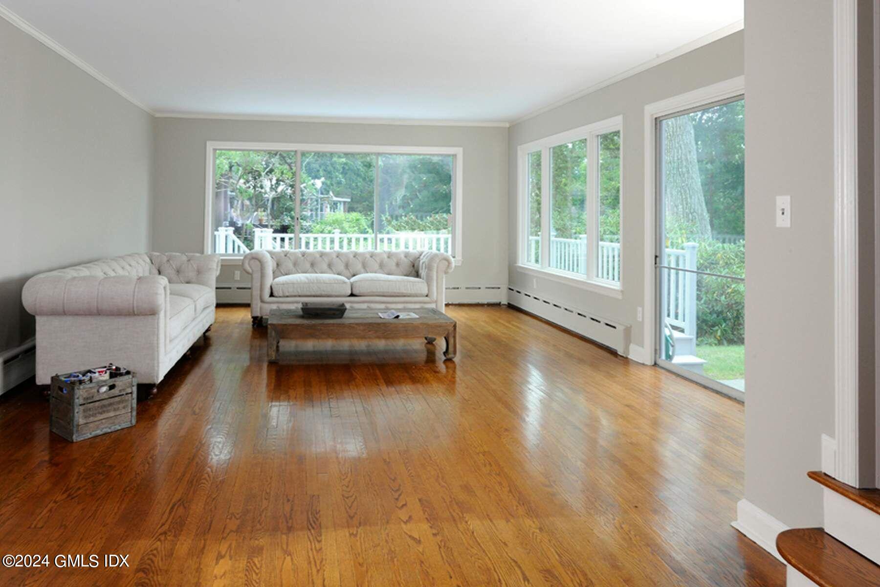 8 Indian Point Lane Riverside, CT 06878 - Photo 5 of 18 a living room with furniture and a large window