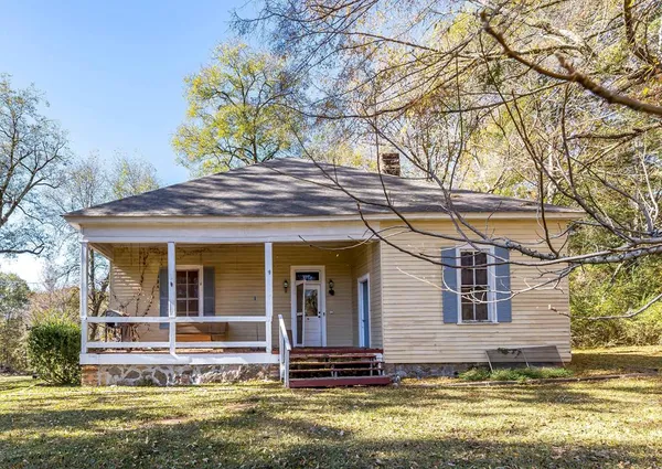 a view of a house with a swimming pool