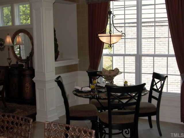 3915 Morvan Way Raleigh, NC 27612 - Photo 6 of 12 The kitchen nook is bright and inviting. Open to the kitchen and dining room.